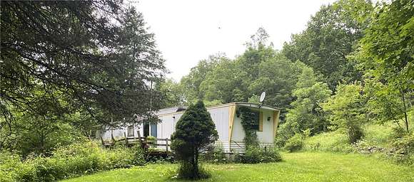 21.2 Acres of Land with Home for Sale in Walton, New York