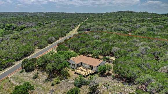 5.45 Acres of Residential Land with Home for Sale in Hunt, Texas