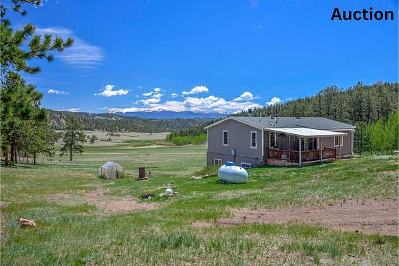 6.3 Acres of Land with Home for Auction in Guffey, Colorado