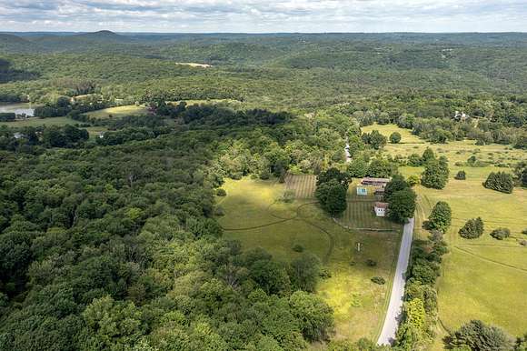 22.34 Acres of Land with Home for Sale in Washington, Connecticut