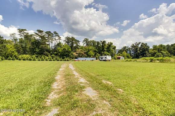 0.6 Acres of Residential Land with Home for Sale in Etowah, Tennessee