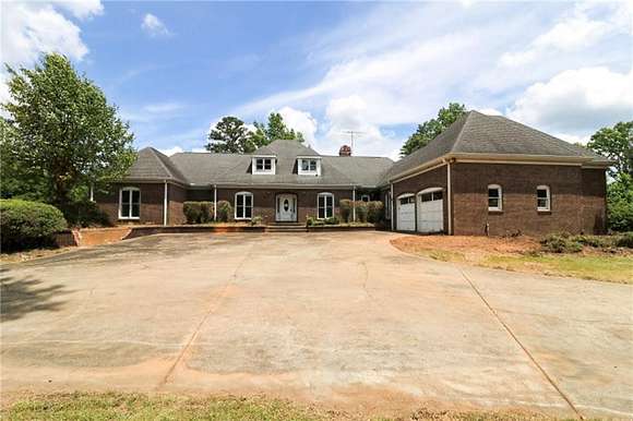 9.52 Acres of Land with Home for Sale in Roopville, Georgia