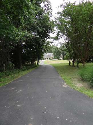 4.5 Acres of Residential Land with Home for Sale in McKenzie, Tennessee