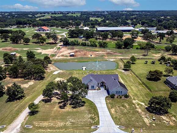 2 Acres of Residential Land with Home for Sale in Pilot Point, Texas