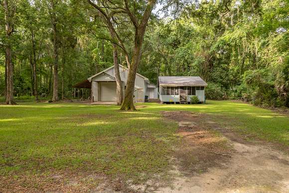 0.68 Acres of Residential Land with Home for Sale in Perry, Florida