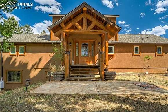 10 Acres of Land with Home for Sale in Woodland Park, Colorado