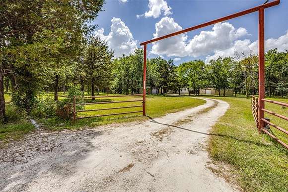 2.55 Acres of Residential Land with Home for Sale in Terrell, Texas