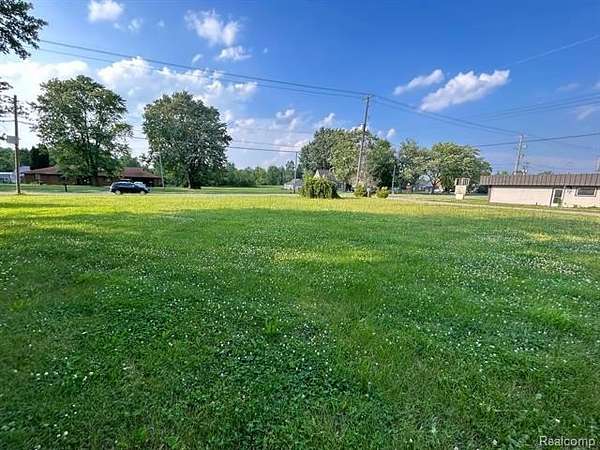 0.34 Acres of Commercial Land for Sale in Burton, Michigan