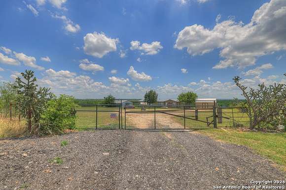 10.39 Acres of Land with Home for Sale in Lockhart, Texas