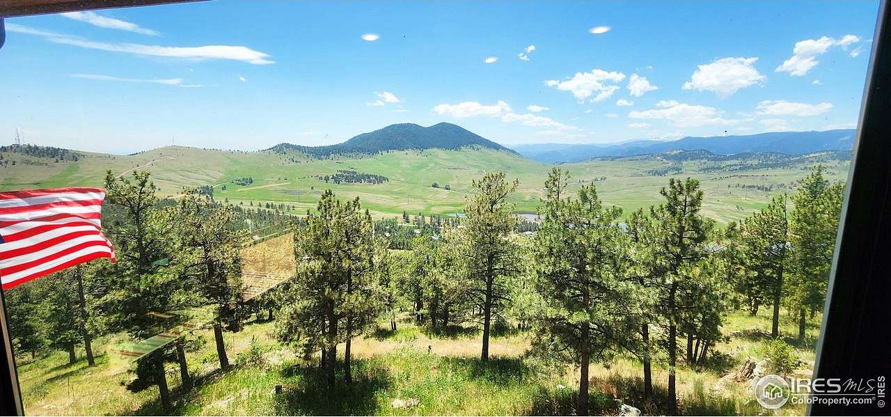 2.35 Acres of Residential Land with Home for Sale in Loveland, Colorado