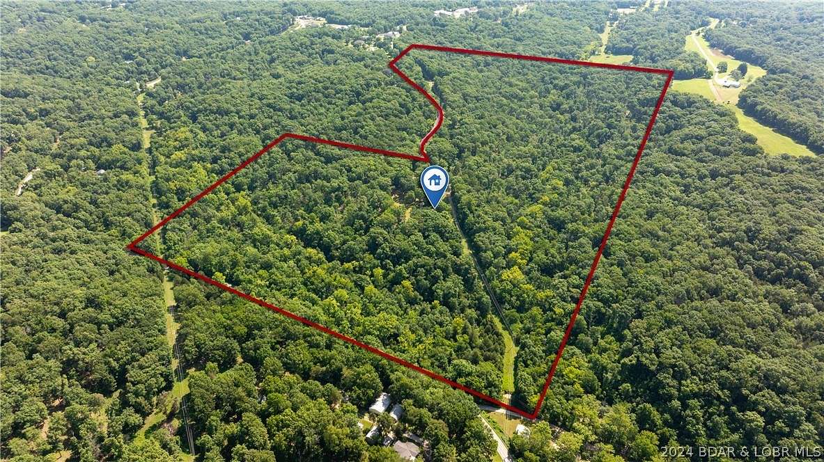 75 Acres of Recreational Land with Home for Sale in Eldon, Missouri