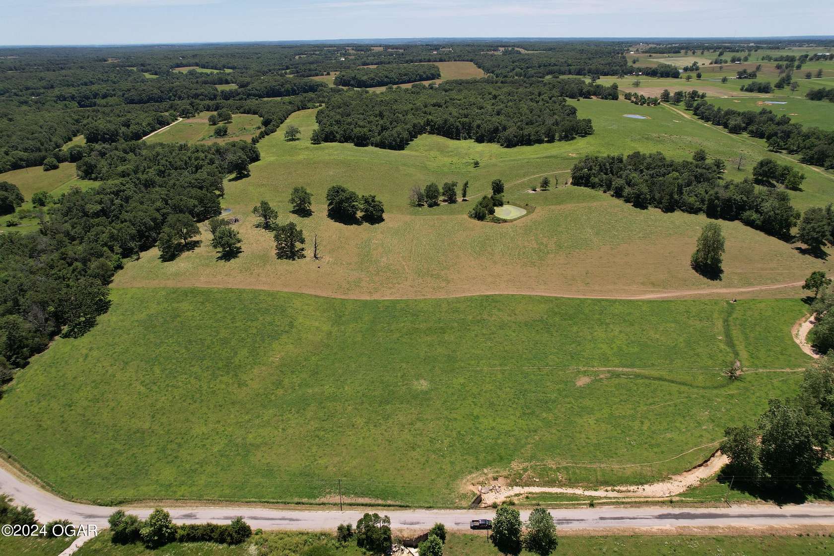 105 Acres of Recreational Land & Farm for Sale in Crane, Missouri