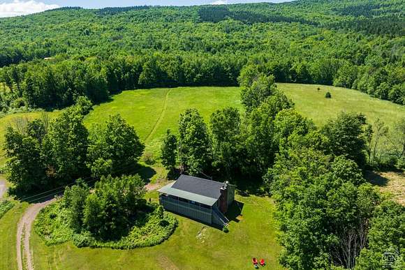 5.61 Acres of Residential Land with Home for Sale in Conesville, New York