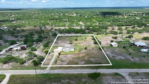 2.5 Acres of Residential Land with Home for Sale in Pleasanton, Texas