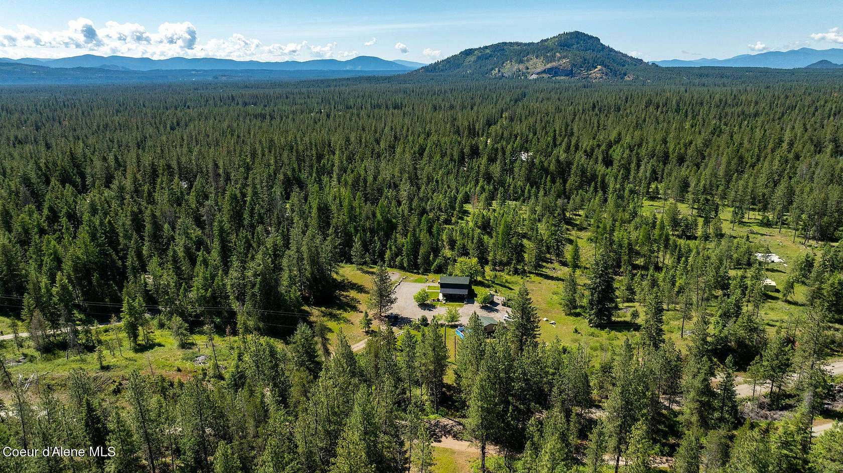 5 Acres of Residential Land with Home for Sale in Athol, Idaho