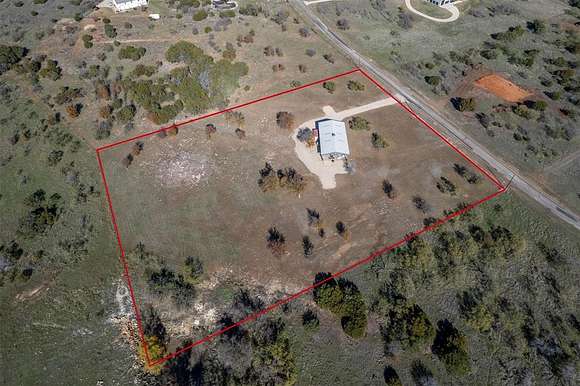 5 Acres of Residential Land with Home for Sale in Strawn, Texas