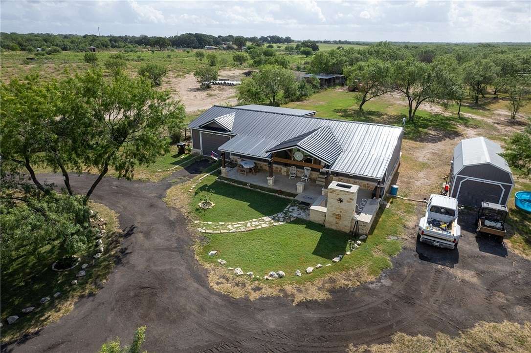 11.76 Acres of Land with Home for Sale in Atascosa, Texas