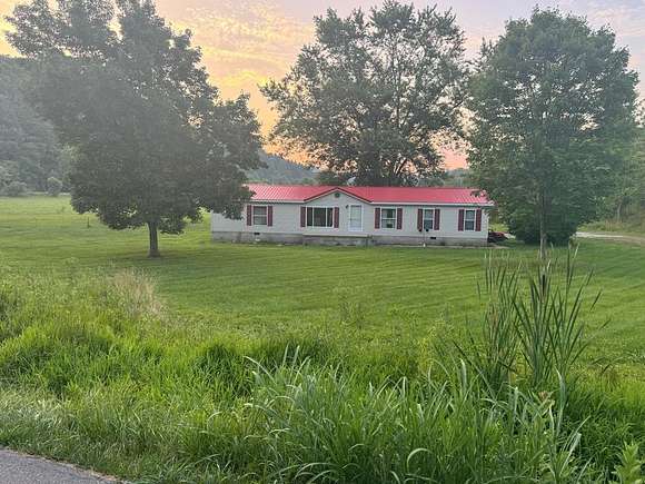 4 Acres of Residential Land with Home for Sale in Salyersville, Kentucky
