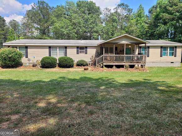 2.97 Acres of Residential Land with Home for Sale in Locust Grove, Georgia