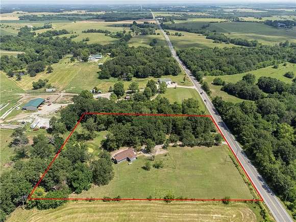 4.8 Acres of Residential Land with Home for Sale in Warrensburg, Missouri