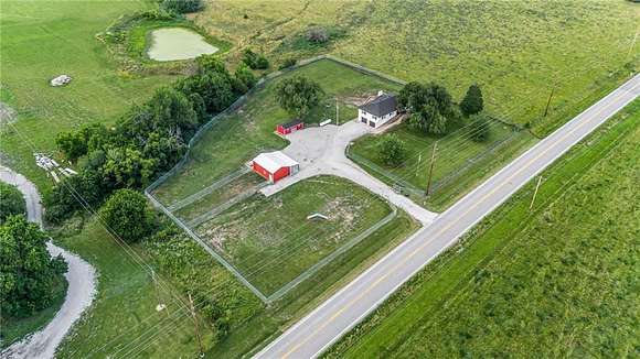 2.5 Acres of Residential Land with Home for Sale in Peculiar, Missouri