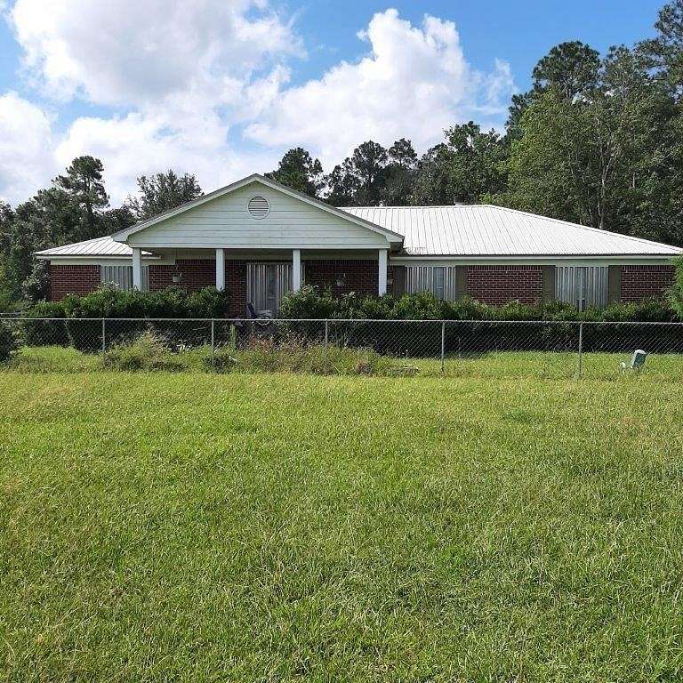72 Acres of Land with Home for Sale in Irvington, Alabama