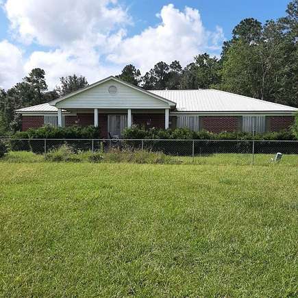 72 Acres of Land with Home for Sale in Irvington, Alabama