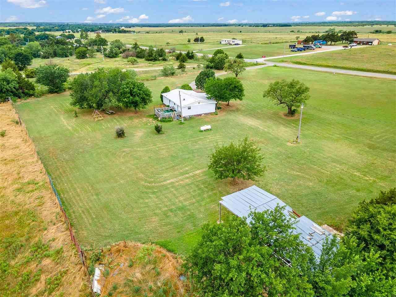 6.25 Acres of Residential Land with Home for Sale in Indiahoma, Oklahoma