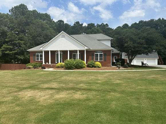 3.95 Acres of Residential Land with Home for Sale in Dacula, Georgia