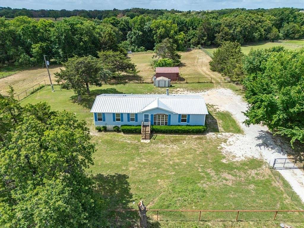 2 Acres of Residential Land with Home for Sale in Decatur, Texas