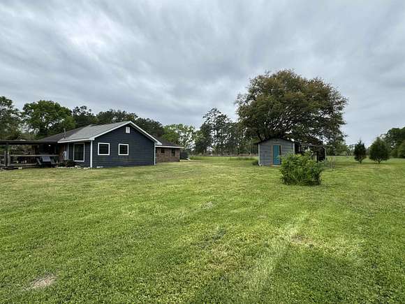 4.96 Acres of Land with Home for Sale in Kirbyville, Texas