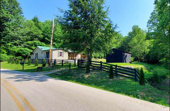 10 Acres of Land with Home for Sale in Campton, Kentucky