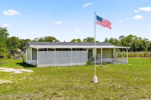 2.4 Acres of Residential Land with Home for Sale in Brooksville, Florida