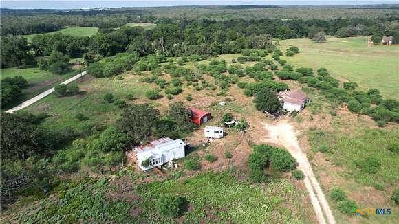 10.055 Acres of Land with Home for Sale in Kingsbury, Texas