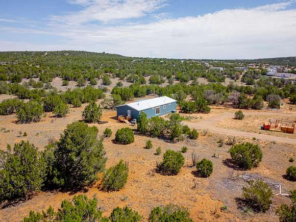 9.8 Acres of Residential Land with Home for Sale in Moriarty, New Mexico