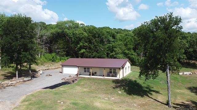 28.923 Acres of Land with Home for Sale in Cookson, Oklahoma
