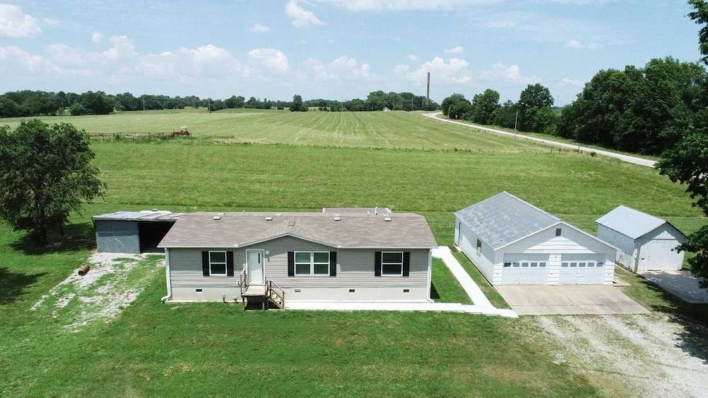 55 Acres of Land with Home for Sale in El Dorado Springs, Missouri