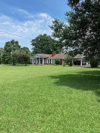 5 Acres of Residential Land with Home for Sale in Paris, Tennessee