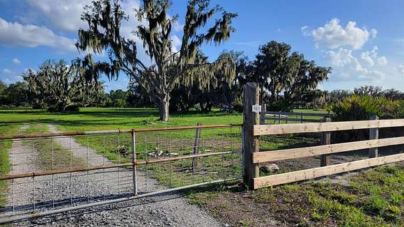 58.64 Acres of Land with Home for Sale in Wimauma, Florida