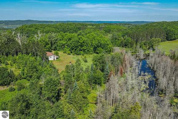 38 Acres of Recreational Land with Home for Sale in Bellaire, Michigan