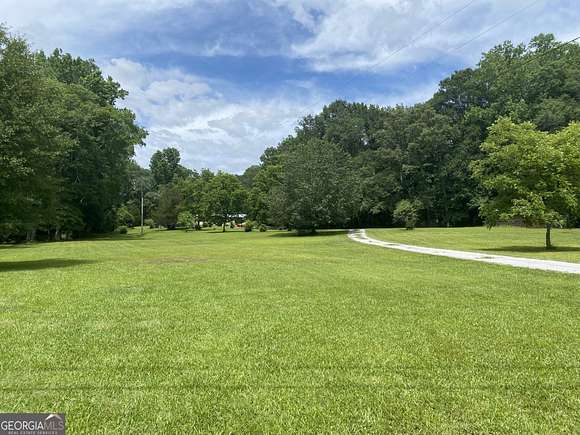8.03 Acres of Land with Home for Sale in Conyers, Georgia