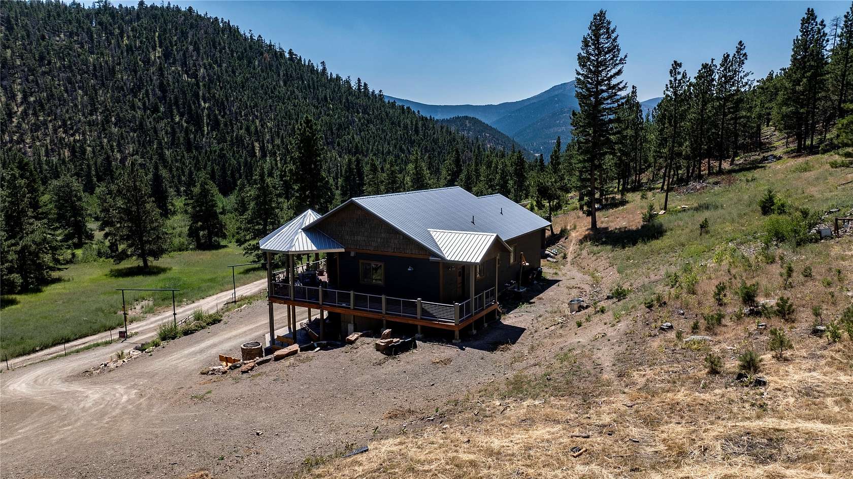 24.3 Acres of Land with Home for Sale in Wolf Creek, Montana