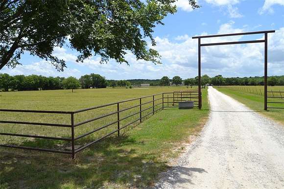 12.5 Acres of Land with Home for Sale in Savoy, Texas