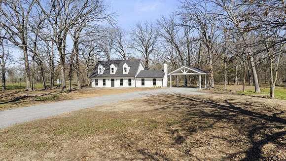 5 Acres of Residential Land with Home for Sale in Mount Pleasant, Texas