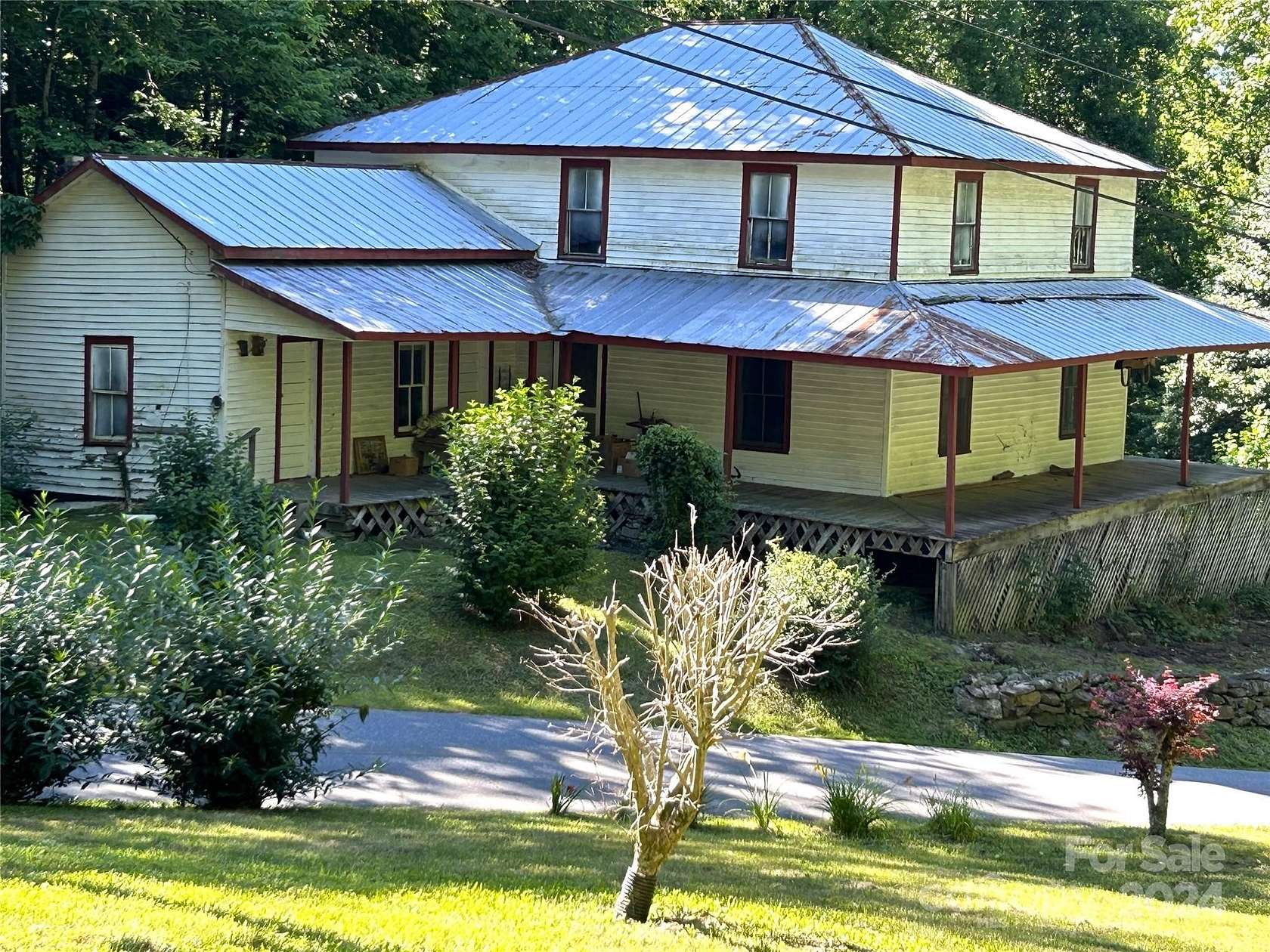 5.79 Acres of Land with Home for Sale in Sylva, North Carolina
