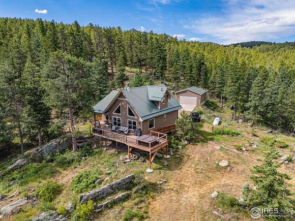 40 Acres of Recreational Land with Home for Sale in Drake, Colorado