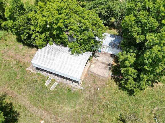 11.53 Acres of Land with Home for Sale in Ozark, Arkansas