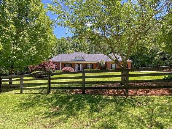 2.1 Acres of Residential Land with Home for Sale in Canton, Georgia