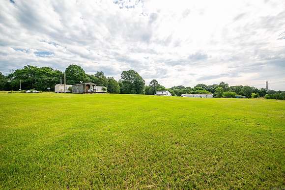 5 Acres of Residential Land with Home for Sale in McRae, Arkansas