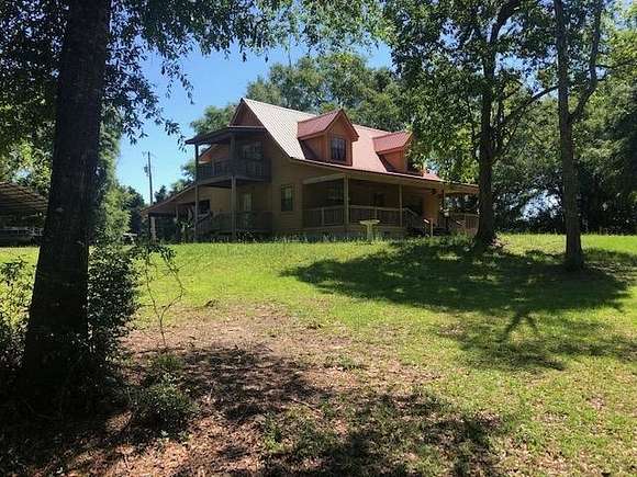 77 Acres of Land with Home for Sale in Libertyville, Alabama